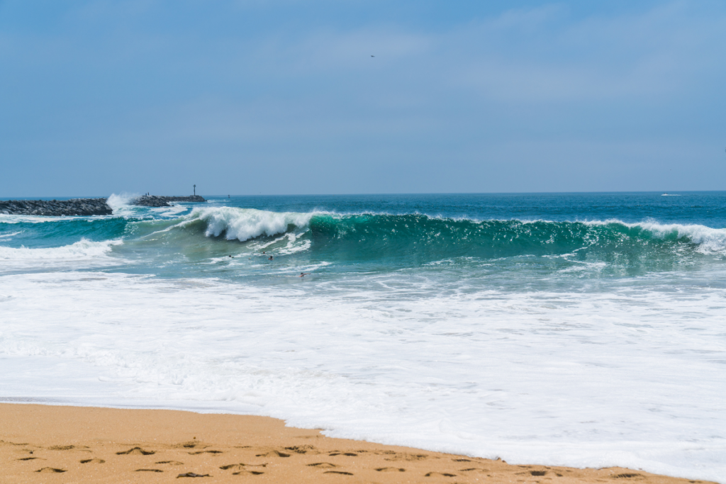 Ocean wave breaking near the shore at Newport Beach