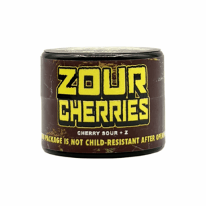 Trilogy Zour Cherries cannabis concentrate container with brown and yellow packaging.